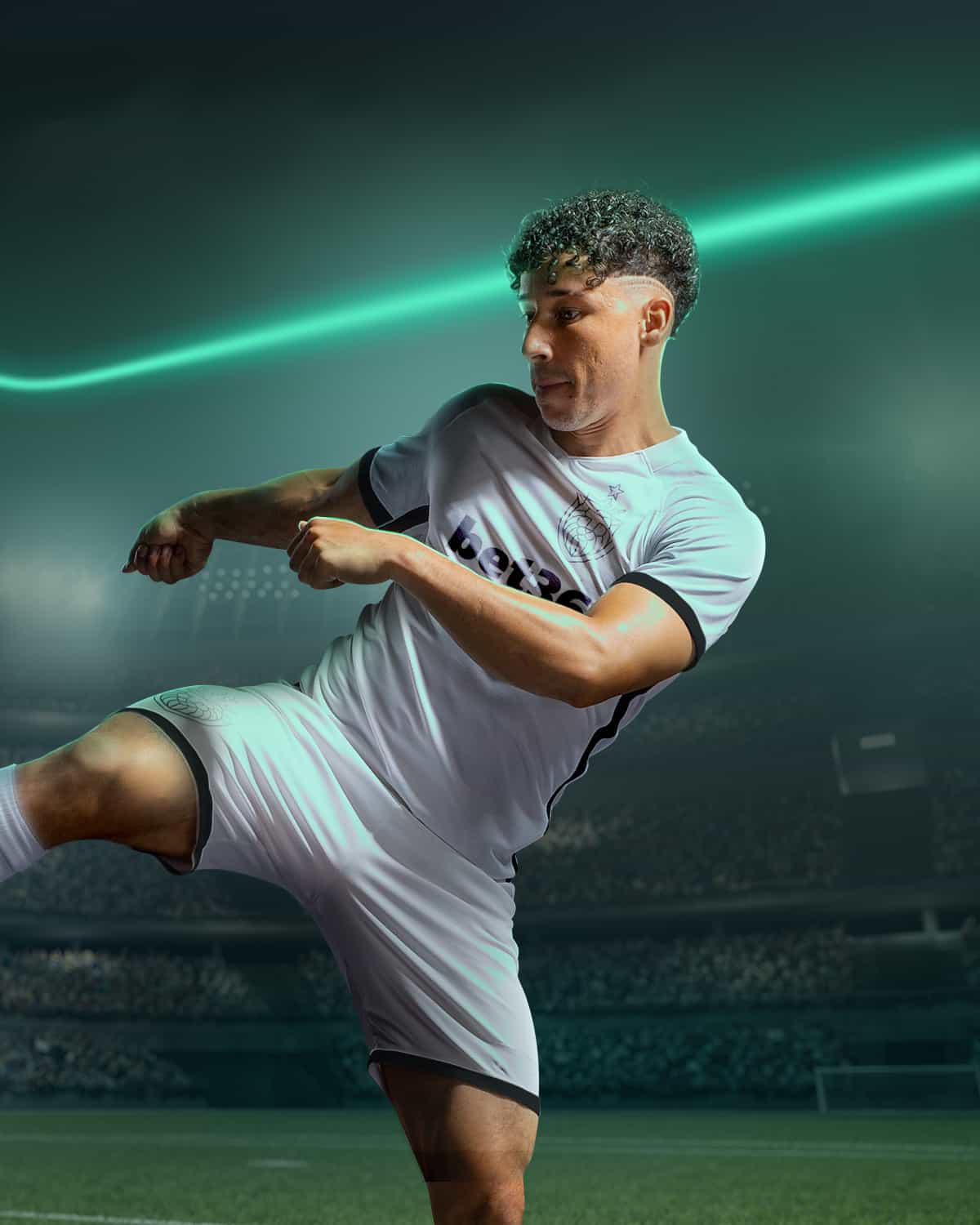 Football player kicking the ball
