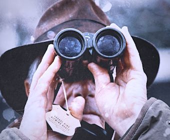 Man with binoculars